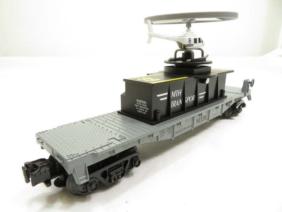 MTH 30-7658 MTH Flatcar w/Flying Helicopter LN